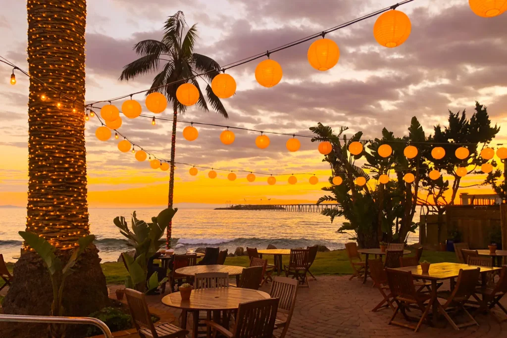 Shoals Restaurant sunset with orange glowing lanterns